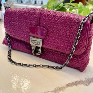 Tod’s Leather signature pink clutch. Great condition